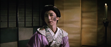 In ancient Japan, a beautiful woman turns her head to expose a strange purple birthmark on her right cheek